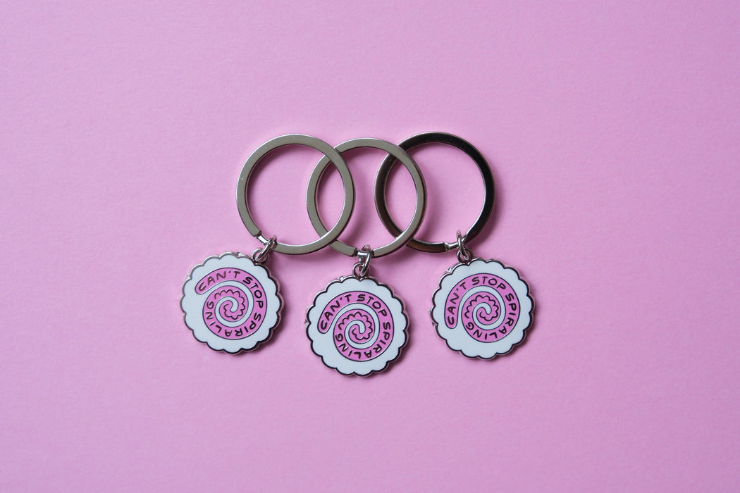 Can't Stop Spiraling Enamel Keychain